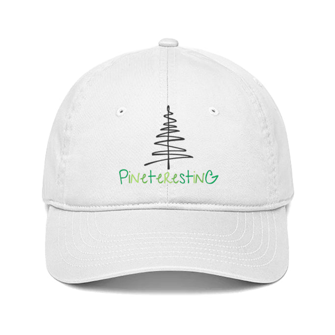 White cap with the word 'Pineteresting' and a sketched pine tree.