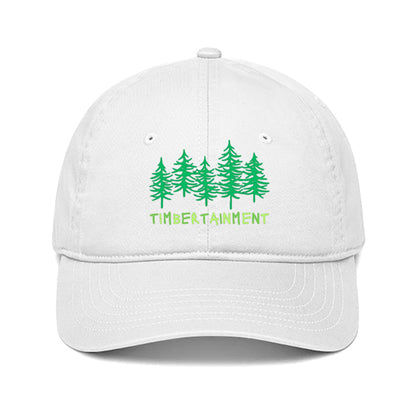 White baseball cap with a green pine forest and includes the word Timbertainment.